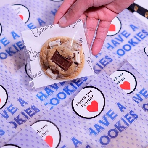 Thank you teacher - Giveaway cookies, you can choose any kind of cookies, or choose mix for all kinds, it comes with stickers with the caption you choose. please write the caption (English or Arabic) down in (leave your message) box