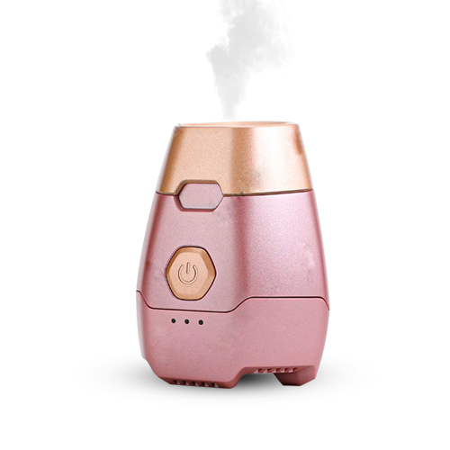 Mini Portable Electronic Incense Burner for Personal and Travel Use - Pink - A unique innovation inspired by the traditional Gulf customs, to help you burn traditional incense in an easy and safe way, this elegant smoke is designed with high quality to preserve the authentic aroma of incense, as it contains a ceramic chamber for placing incense chips and a high heating element that reaches the same temperature as the coal. 
 Advantages: Heating up to 450°C Long lasting battery Equipped with a cleaning tool and a small USB charger Automatic cooling after two minutes of use - Three steering lights 
 Usage: a) The method of placing incense: - remove the gold cap - Place the incense so that the oily side is far from the heating device - lid closes 
 b) Operation method: The button is double pressed to turn on - The chisel is installed in a horizontal manner - After use, double press the button to turn off - To check the battery life, the button is pressed for 2 seconds continuously 
 c) Cleaning method: After use, leave the device for 5 minutes to cool down The bristles of the metal brush are placed inside the ceramic chamber The tool rotates 90 degrees to the right and left