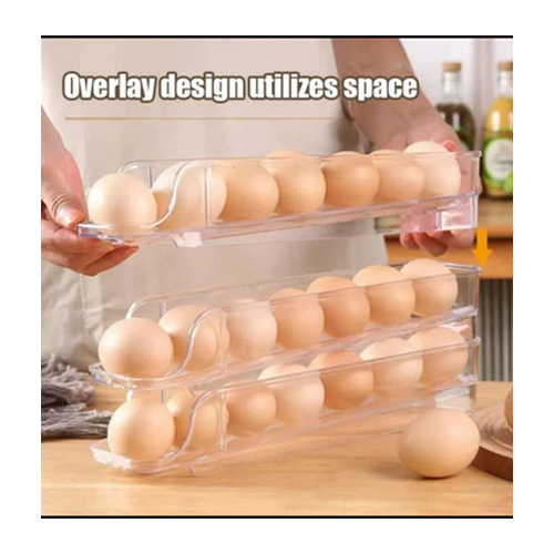 ACRYLIC ROLLING EGG BOX 1017 - The acrylic rolling egg box is a sleek and transparent storage container designed to hold eggs securely while providing easy access and organization. Crafted from durable acrylic material, this box offers a clear view of the eggs stored inside, allowing you to quickly assess your supply. Its rolling feature enables smooth movement, making it effortless to retrieve eggs from different angles without lifting the entire box. With its compact and practical design, the acrylic rolling egg box is an ideal solution for keeping eggs fresh and neatly arranged in your refrigerator or kitchen countertop.Transparent Design: Made of clear acrylic material, allowing easy visibility of the eggs stored inside. Rolling Mechanism: Equipped with wheels or a rolling mechanism that enables smooth movement, making it effortless to access eggs from various angles. Secure Storage: Provides secure compartments or slots for each egg, preventing them from rolling around and potentially cracking. Capacity: Available in different sizes to accommodate varying numbers of eggs, typically ranging from a dozen to several dozen eggs. Durable Construction: Constructed from sturdy acrylic material, ensuring durability and long-lasting use. Easy to Clean: Designed for easy cleaning, usually with simple soap and water, to maintain hygiene and freshness. Space-Saving: Compact design helps save space in the refrigerator or kitchen countertop while maximizing egg storage capacity.. Airtight Seal (Optional): Some models may feature an airtight seal or lid to help preserve the freshness of the eggs for a longer period. Stackable (Optional): Certain designs may be stackable, allowing you to stack multiple egg boxes on top of each other to save even more space.