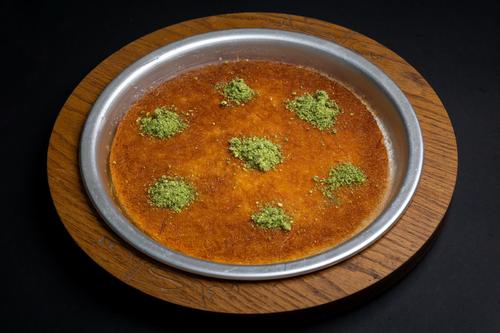 Fan Al Kunafa - Kunafa Brown With Cheese - Brown konafa with nabulsi cheese served with pistachio and syrup