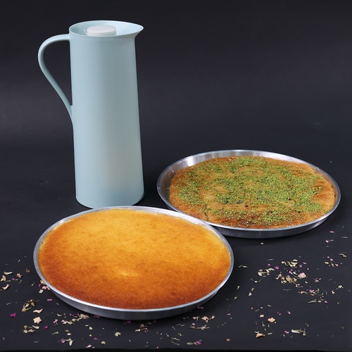 Shakra kunafa with cheese and basbousa with Arabic coffee