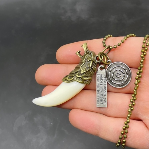 Wolf teeth pendant