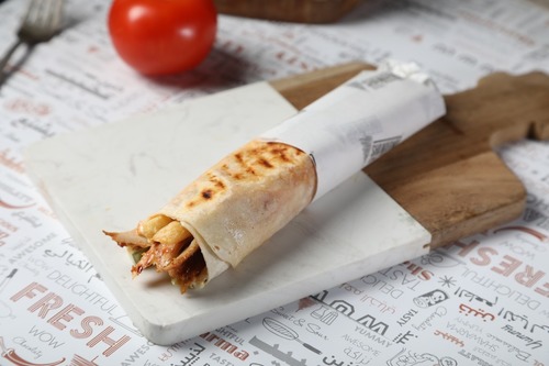 Chicken Shawarma - Chicken shawarma in fresh Saj Bread , choose your way and sauce