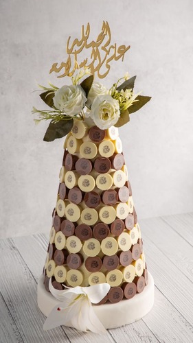 Chocolate pyramid - 147 pcs x 11 gram equals 1.617 kg 
 White chocolate  1. Peanut filling  2. Cheese Mascarpone filling  3. Mastica cream filling Milk Chocolate  1. Cappuccino filling 2. Almond filling 3. Praline filling