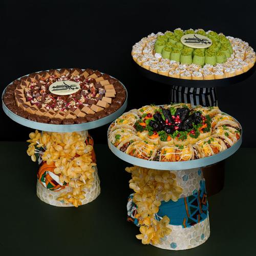 Eid Offer 3 Trays - Mix between tray ghoraiba pistachio and walnut 1.400 kg Tray mix chocolate 1 kilo Tray mix mowaleh 55 pcs