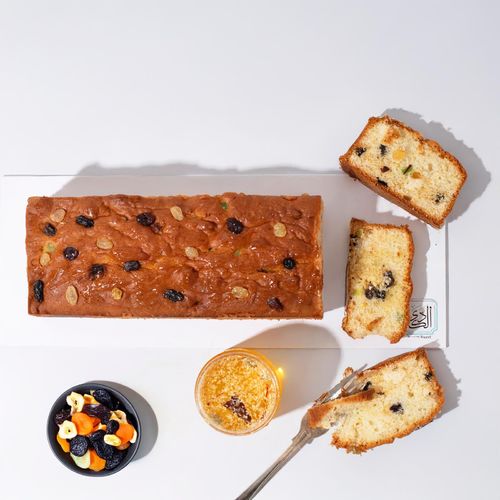 Al-Duha Tea Cake ( Dried Fruit) - Cake with dried fruit and handmade sauce mix saffron and cardamom and Darsin