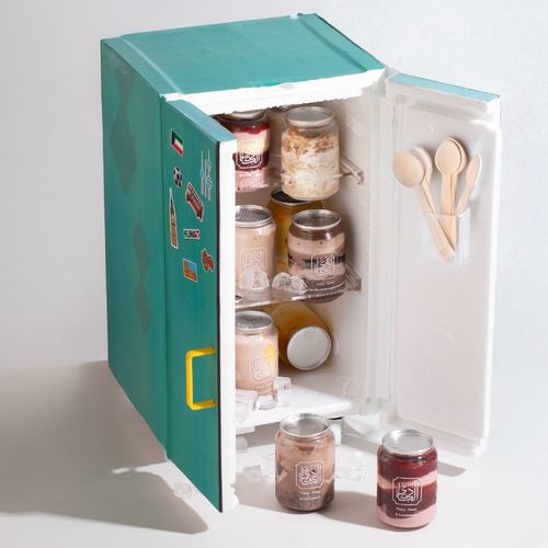 Alkadi Fridge - A cooler-box designed like a mini fridge, filled with 15 ice cream pieces 🍦 
 🍫 Chocolate ice cream with cherry filling and ganache sauce 🥭 Mango ice cream with vanilla cake and fresh mango chunks 🍓 Strawberry ice cream with vanilla cake and strawberry filling 🌀 Mixed mango, vanilla & chocolate ice cream 🌿 Mastic ice cream with baklava