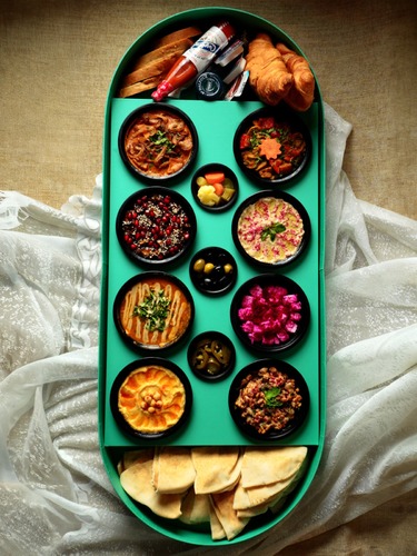 Alkadi Breakfast - We changed the presentation… and the box turned out even more elegant and organized 😍 Inside, you’ll find 8 delicious assorted dips & sides 👌 🍆 Eggplant Dip 🫓 Mutabal 🫘 Foul 🥔 Potato Dip with Mango Pickle 🥦 Cauliflower Dip 🧀 Halloumi with Mushrooms 🥗 Feta Cheese with Beetroot 🥣 Hummus Served with extra sides to complete the breakfast experience ✨ Black Olives - Pickles - Jalapeño - Carrots & Cucumbers Lebanese Bread - Brioche - Croissant Honey - Nutella - Jam Hot Sauce - Butter 💰 Price: 18 KD ☕️ Add a Karak Tea Dallah for 6 KD A fresh new look… with the taste you already love 😍