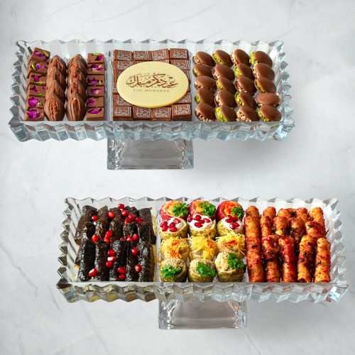 Eid Al-Adha Combo - A mixed cocoa tray, mixed pistachio, pecan caramel, and Cheese brownie A mixed pastries tray (12 pieces) 15 grape leaves&nbsp; 15 musakhan pieces