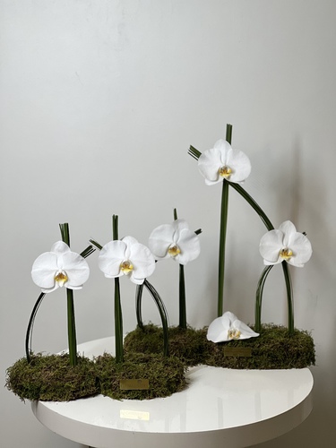 Flowers By J  - J 3 exclusive - 1 center piece  2 side tables