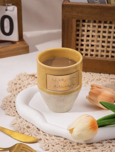 Domo Kuwait - كوب بعبارة عربية (وتشاء انت من الاماني نجمة) – اصفر - Handmade ceramic mug 
 Suitable for hot and cold drinks
 
 Wash normally without using a dishwasher