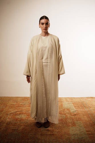 Layered bisht set (Offwhite) - The Layered Bisht Set&nbsp;features a refined three-piece design consisting of a suede skirt and top, a sheer bisht embellished with intricate hand embroidery and hand-stitched crystal accents, and a velvet bisht finished with a smooth silk lining. Each piece can be worn individually or layered together, offering versatile styling options for a sophisticated, contemporary look. One size
 Color: Offwhite