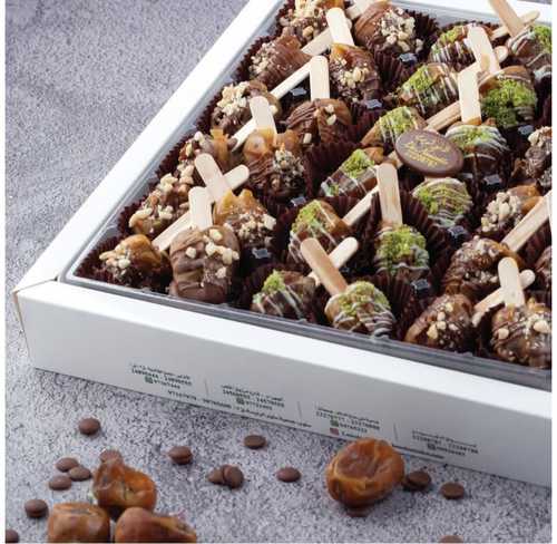 لانوازيت - تمر استيك  36  حبة - 36 dates stuffed with mixed nuts and dipped in premium Belgian chocolate  36 حبه من تمر محشو بالمكسرات المشكله مغموس في الشكلات البلجكي الفاخر