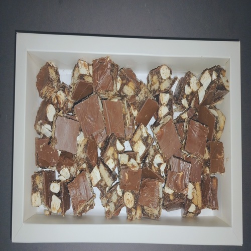 Rocky Road - Rocky Road is a luxurious Belgian chocolate blended with digestive biscuits and soft marshmallows for a unique dessert experience with wonderful flavors.