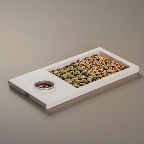 Al-Ahram Sweet - Al-Ahram Sweet is crispy and delicious, prepared with premium pistachios and rich Nutella. Served with authentic Arabic coffee.
