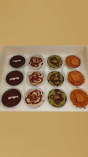 Molten Cake - Warm molten cake with rich chocolate and a liquid chocolate sauce inside flavored with lotus, kinder and Dubai sweet.