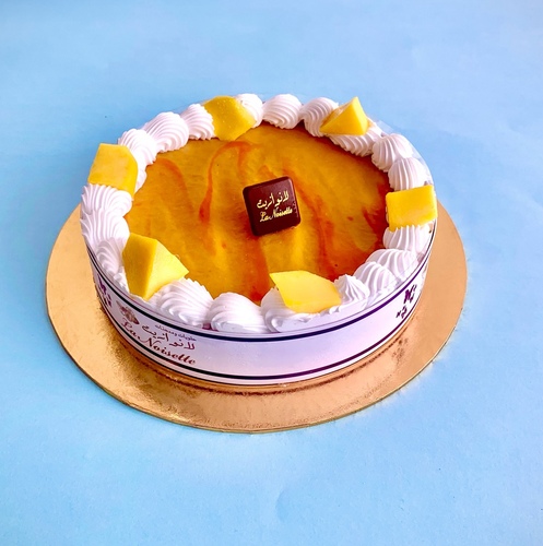 Mango Cheese Cake - Cheese cream,  Mango cream with fresh Mango pieces and Digestive biscuits medium size good for 6 persons