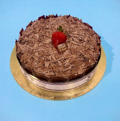 Black Forest cake - Chocolate sponge cake, vanilla cream, strawberry jam and chocolate flakes