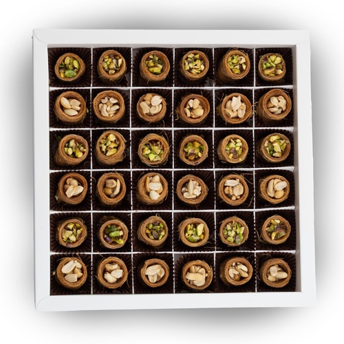 عش البلبل - حلوى عش البلبل الشهية مصنوعة من الكنافة الطرية المحشوة بالفستق اللذيذ و تقدم مع القطر الحلو المميز