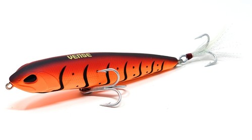 Tumbao 130 Surface Lure - The Tumbao lure is an evolution stick designed for superficial action. Featuring a chip resistant body coat, an internal rattling system, MUSTAD hooks and a variety of attractive colors for different species. Depending on its movement and how fast it is used, it can function as a walker or a stick. They are ideal for fresh and saltwater. 
 Type: Floating Size: 6 in / 130mm Weight: 1.17oz / 33.2gr Action: SLIDING / FAST- SUPERFICIAL Depth: 0ft.