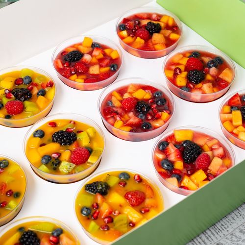 Villa Vanilla - Mix Fruit Salads - Yellow and Red Fruits Salads Grapes, cranberries, blueberries, blackberries, mango, strawberries, kiwi pomegranate, watermelon with juice