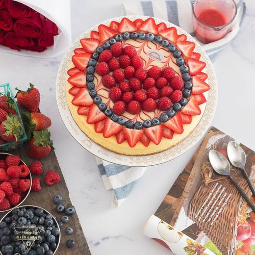 Cheesecake With Berries  Heart Shape - Cheesecake garnished with berries on heart shape.