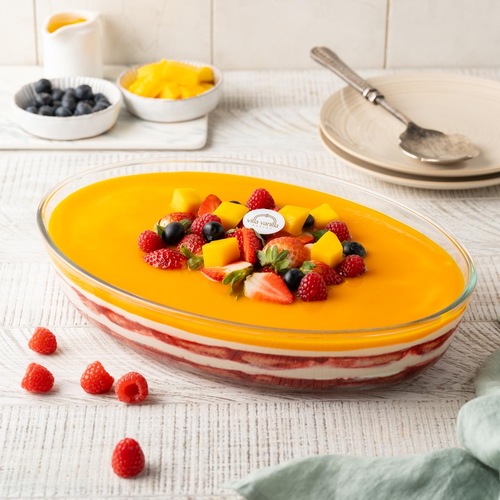Mix berries with mango in Pyrex