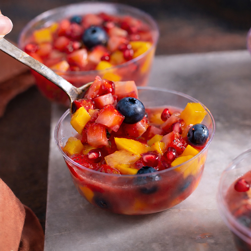 Red fruits Salad - Grapes,&nbsp;Pomegranate, blueberries, mango, strawberries, kiwi pomegranate, watermelon with strawberry juice