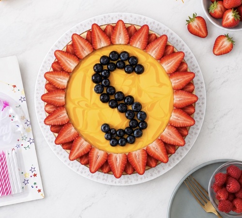 Cheese Cake letter Mango With blueberry and strawberry