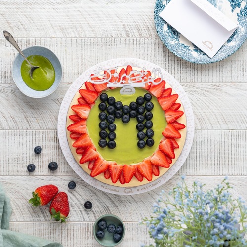 Letter Cheesecake with blue berry and strawberry