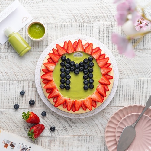Letter Cheesecake with blue berry and strawberry