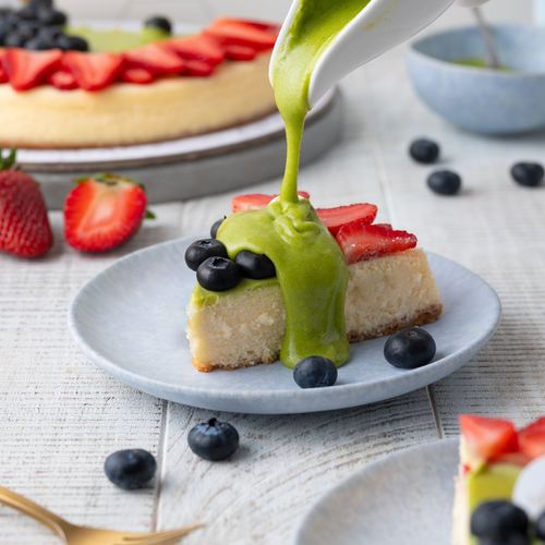 Letter Cheesecake with blue berry and strawberry