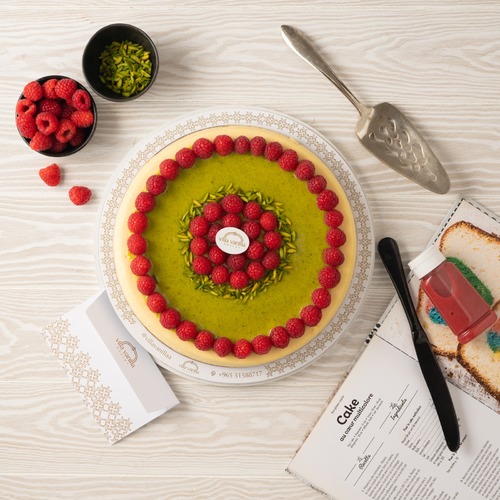 Pistachio Cheesecake With Caramel And Raspberry In The Center