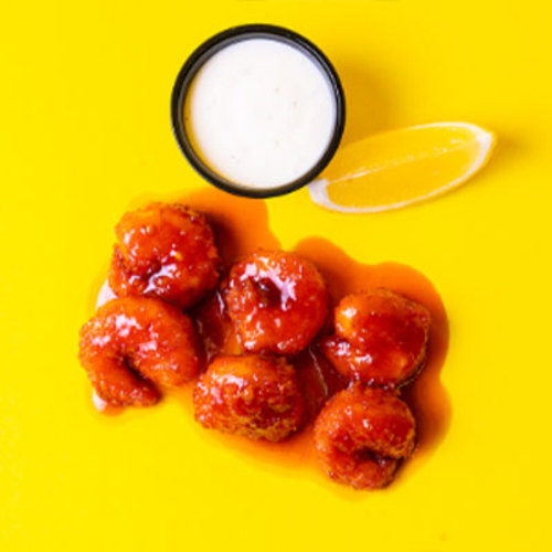 Buffalo Shrimp - Fried shrimp with buffalo sauce and ranch sauce.