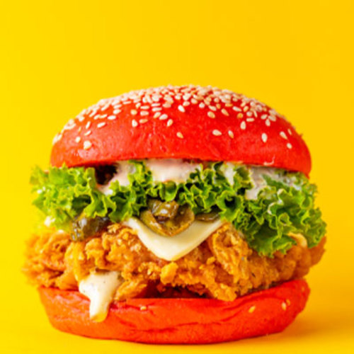 Chicago Spicy Chicken - A piece of tender fried chicken breast with spicy jalapeno sauce