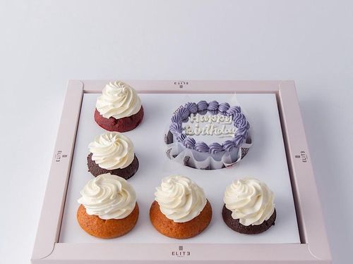 Cupcake Cake 3 - A 4-inch cake, enough for 1 to 2 people. The flavors are vanilla and strawberry. Comes with 5 cupcakes.