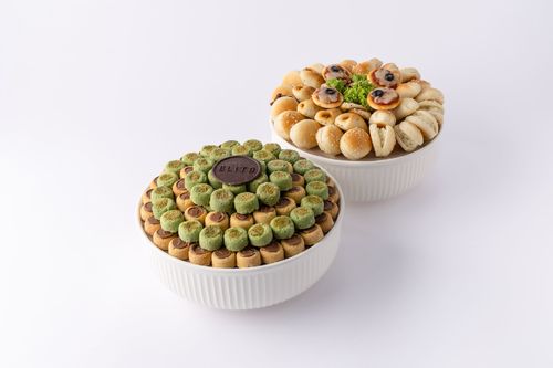 Fatayir and Ghraybeh Tray E6 - A tray of pies and shortbread with different fillings