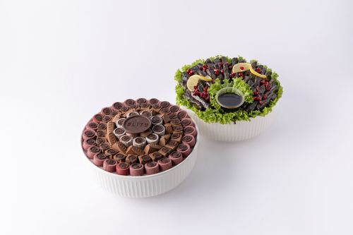 Chocolate and grape leaves trayE11 - Belgian chocolate tray and stuffed grape leaves with pomegranate molasses and lemon