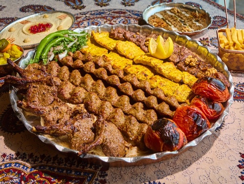 Abshar Grill ( for 6-7 persons) - 5 kebab koobideh  2 jojah kebab 5 pieces of ribs 1 kebab tarsh kashk eggplant hummus 2