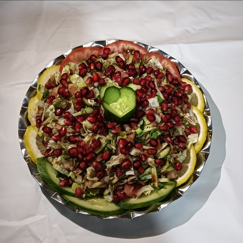 Salad anar Pomegranate - Cucumber, tomato, lettuce, olive oil, lemon and vinegar.