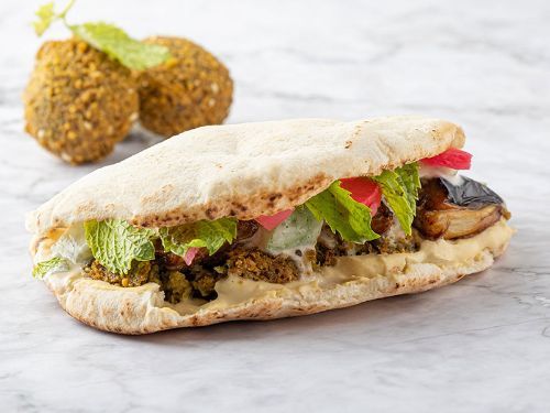 Mesh Bas Falafel - Super Eggplants Sandwich - Eggplants, tahini, salad, pickles, mint and hummus.