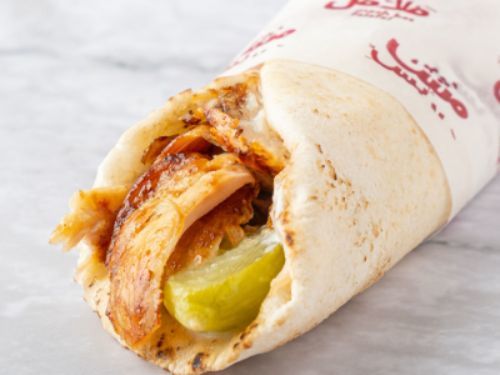 Chicken Shawarma Sandwich - Chicken shawarma, pickles and garlic sauce