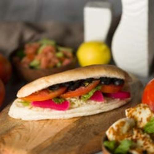 Mesh Bas Falafel - Halloumi Cheese Sandwich - Halloumi cheese, tomatoes, olives and zaatar.