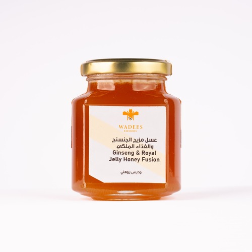 Ginseng & Royal Jelly Honey Fusion - A thick-textured honey characterized by the presence of red ginseng, considered one of the best
types of ginseng in the world. Ingredients: Sidr honey Royal jelly Red Ginseng
Benefits: Boosts the immune system and energy levels Aids in improving memory and concentrationSymptoms: Not recommended for use by pregnant or lactating women and individuals with high blood
pressure. How to Use: Take one medium spoonful, mixed with a cup of lukewarm water.