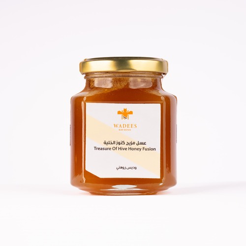 Treasure of Hive Honey Fusion - Description:
This honey is known for its tangy taste and dark color.
It contains a potent mix of Sidr honey, nutrient-rich bee pollen, antiviral propolis, and invigorating royal jelly.Health Benefits:
Enhances male sexual performance and increases sperm count.
Stimulates ovaries and improves fertility in women.
Activates pituitary glands and improves memory and focus.
Antimicrobial and may help relieve hemorrhoids.
Warnings:
Not recommended during pregnancy and breastfeeding.
Propolis may worsen asthma symptoms; not suitable for asthma patients.
Not safe for individuals with high blood pressure.
Best consumed when blood sugar is stable.
Recommended dose: 1 medium spoon mixed with 1/4 cup of lukewarm water.Weight: 275g