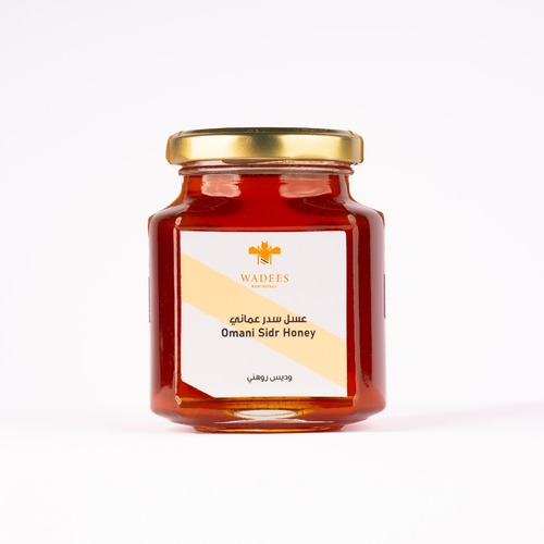 Omani Sidr Honey - This honey is collected from our beehives in the valleys of Oman. It is characterized by a
stronger Sidr fragrance than any other type of honey. Ingredients:
Omani Sidr honey. Benefits: Antibacterial and antifungal properties. Source of energy. Rich in antioxidants.
Symptoms: Not recommended for use by those allergic to honey..
How to Use: Mix one medium tablespoon with a quarter cup of warm water. Size: 275 gm