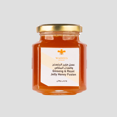 Ginseng & Royal Jelly Honey Fusion - A thick-textured honey characterized by the presence of red ginseng, considered one of the best
types of ginseng in the world. Ingredients: Sidr honey Royal jelly Red Ginseng
Benefits: Boosts the immune system and energy levels Aids in improving memory and concentrationSymptoms: Not recommended for use by pregnant or lactating women and individuals with high blood
pressure. How to Use: Take one medium spoonful, mixed with a cup of lukewarm water.