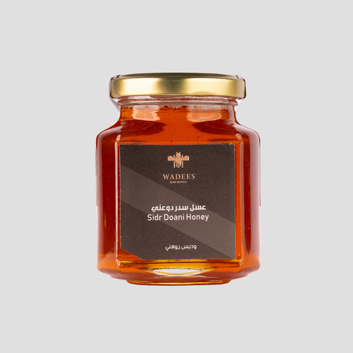 Sidr Doani Honey - Description:
This premium honey is harvested from Wadi Doan, one of the valleys in western Hadhramaut, located in the Hadhramaut of Yemen.
Wadi Doan is renowned for producing some of the finest honey in the region and represents the highest part of Wadi Hadhramaut, where the valley splits into right and left branches.
Benefits:
Strengthens the immune system and helps the body resist illnesses such as influenza.
Promotes the production of white blood cells that fight bacteria and viruses.
Supports heart health and may help prevent cardiovascular diseases.
Aids in treating anemia.
Enhances memory and strengthens the nervous system.
Usage Tip:
It is recommended to consume honey when blood sugar levels are not high. Mix a medium-sized spoon of honey with a quarter cup of lukewarm water for best results.