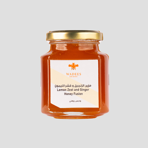 Lemon Zest & Ginger Honey Fusion - Description:
This warm-tasting natural blend acts as an effective antibacterial mixture, combining the richness of Sidr honey, lemon peel, and ginger.Ingredients:
Sidr Honey
Lemon Peel
Ginger
Benefits:
Helps treat respiratory infections, colds, and flu
Soothes a sore throat
Regulates blood sugar levels
Relieves menstrual pain in women
Supports natural weight loss
Side Effects:
Not recommended for individuals allergic to honey or bee products
Usage Instructions:
Mix one medium spoon with 1/4 cup of lukewarm water
Best taken on an empty stomachWeight: 275g