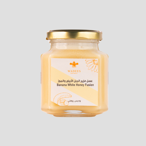 Banana white mountain honey - Banana blended with white mountain honey extracted from the nectar of lavender and
chamomile flowers from our apiaries in Kyrgyzstan. It is considered a healthy and delicious
alternative to ice cream when chilled. Ingredients: White mountain honey Banana.Benefits: Antibacterial and antifungal. Soothes the throat. Source of energy. Soothes the skin. Rich in antioxidants.
Symptoms: Not recommended for those allergic to honey. How to Use: The honey can be added to various recipes to enhance flavor and add sweetness.